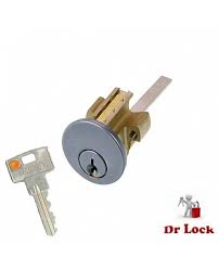 Locksmith cylinder with key for secure door access.
